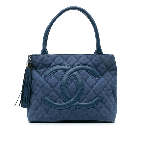 Chanel Handbags - Pre-Loved Chanel Quilted Canvas and Caviar Tassel Tote